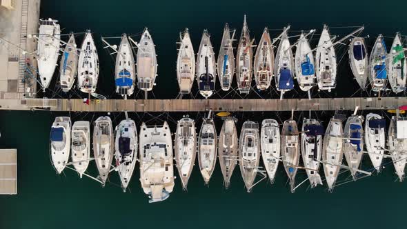Aerial View of the Marina. Parking Boats From a Height. Port with Yachts. City Pier