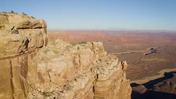 Aerial shot of the cliffs along the edge of Cedar Mesa in Southern Utah