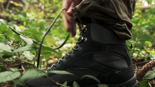 Side View of a Lacing Man Leather Boot. Close Up