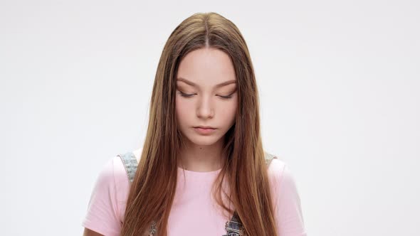 Sad Young Beautiful Girl Jittering Over White Background