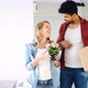 Young Happy Couple Moving in New Home and Unpacking Boxes - VideoHive Item for Sale