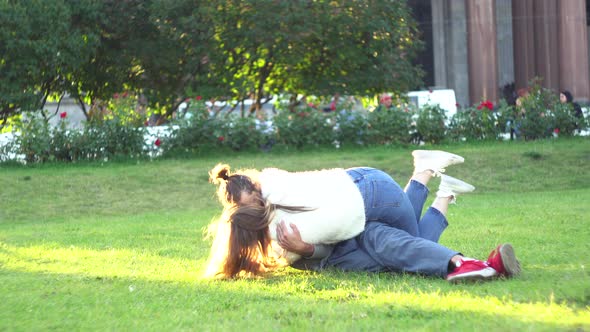 Caucasian couple having fun together in a city park