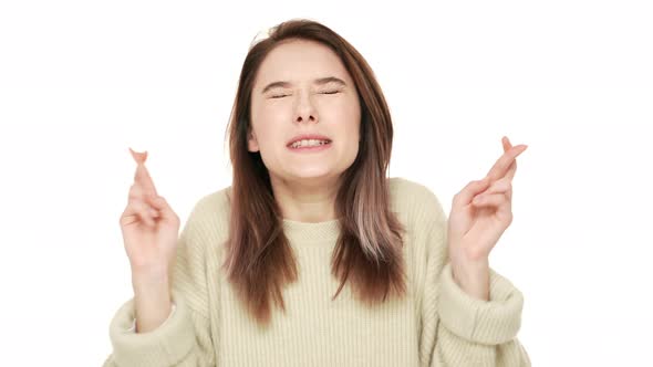 Portrait of Concentrated Woman Dressed in Casual Willing Good Luck Pleading with Keeping Fingers