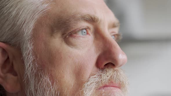 Old Man's Eyes Closeup Footage: Pensive Old Man Thoughtful Elder