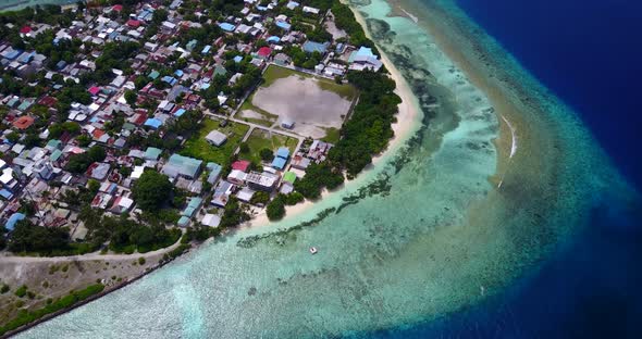 Luxury drone copy space shot of a white sandy paradise beach and blue sea background in hi res 4K