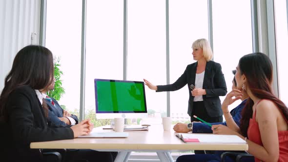 Business People in the Conference Room with Green Screen