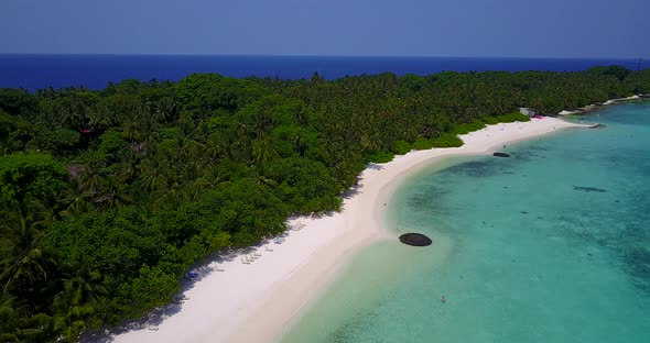 Beautiful birds eye copy space shot of a sunshine white sandy paradise beach and aqua blue water bac