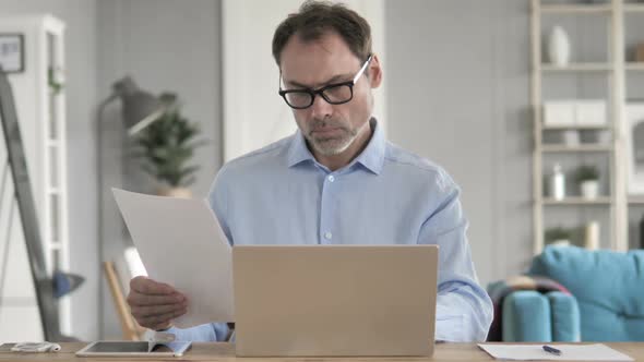 Paperwork By Old Businessman