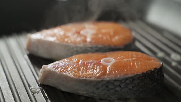 Salmon Fish Roasting on a Grill