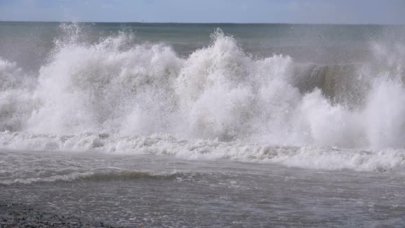 Storm on the Sea. Huge Waves Are Crashing and Spraying on the Beach