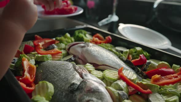 Mother Teaches Her Little Son How to Cook Healthy Food in the Kitchen