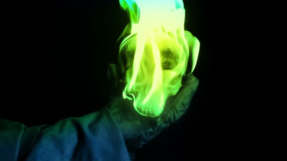 Sorcerer Throws Green Flaming Skull At Camera