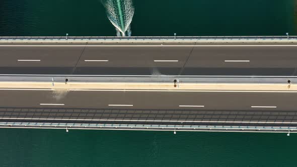 Road and traffic. Aerial view on the cruise ship and bridge in the port.