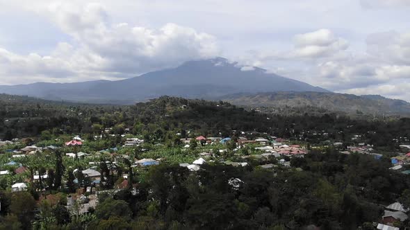 Incredible Aerial Shot Flying Towards Mount Meru Over Arusha Town Tanzania