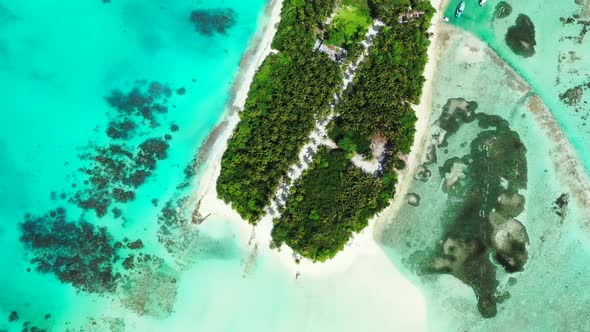 Aerial texture of idyllic island beach adventure by turquoise sea with white sandy background of a d