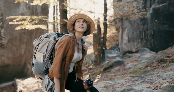 Young Traveler Female in Autumn Forest