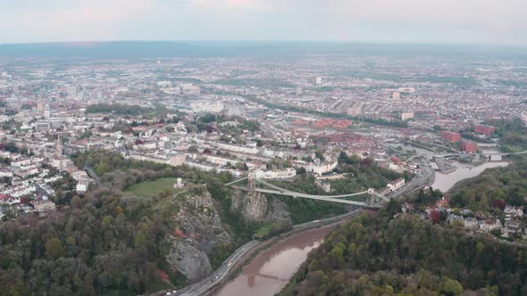 High circling drone shot over central Bristol and the clifton suspension bridge