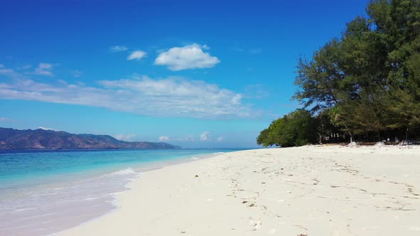 Wide above abstract shot of a summer white paradise sand beach and aqua blue ocean background in vib