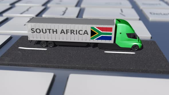 Flag of South Africa on Moving Truck and Computer Keyboard