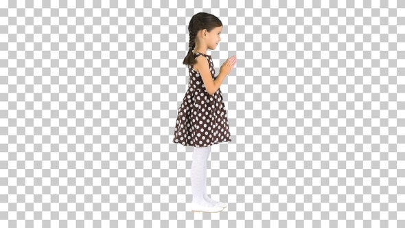 Little girl in polka dot dress clapping her hands, Alpha Channel