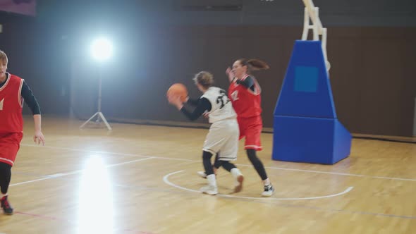 Women's Basketball Championship Training Game the Confrontation of Two Team of Basketball Players