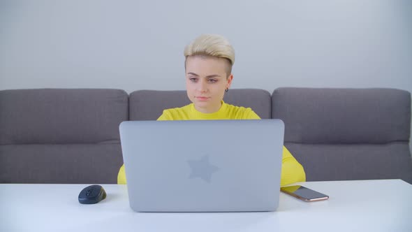 Young woman working online freelance during lockdown in 4k stock video