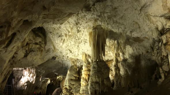 Hall deep inside underground  cavern slow tilt 1920X1080 HD footage - Cave formations of stalactites
