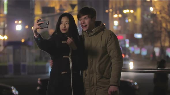 Couple of Teenagers Posing for Selfie, Friends Making Faces for Funny Photo