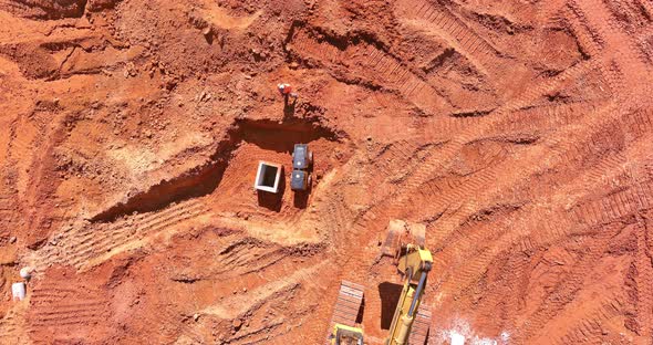 Aerial View of Excavator at Construction of Water Main Sanitary Sewer Storm Drain Systems