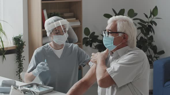 Senior Patient Being Vaccinated against Covid