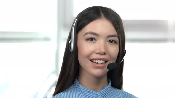 Cute Asian Girl with Headset.