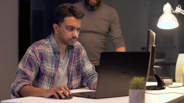 Men with Computers Working Late at Night Office 17