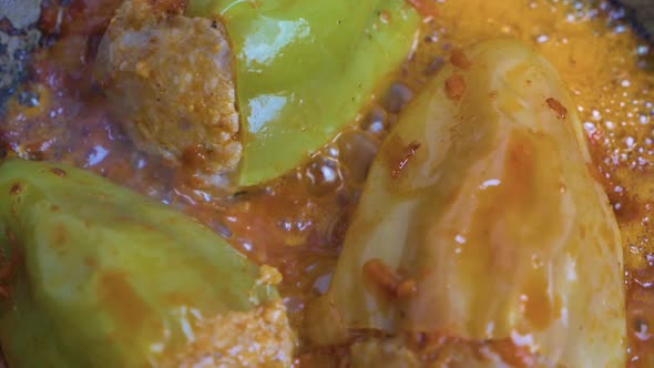 Tomato Sauce Boils in a Pan with Bell Pepper.