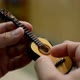 Close  Up of Fingers Playing a Small Toy Guitar - VideoHive Item for Sale