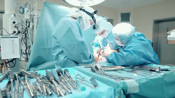 Surgeons are Carrying Out a Medical Procedure Together