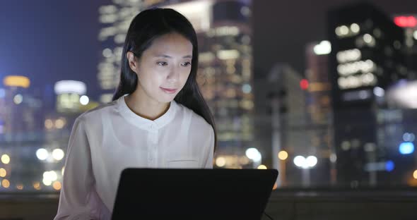 Business Woman Working on Laptop Computer at Outdoor