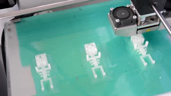 3D Printer Working and Creating an Object From the Hot Molten Plastic