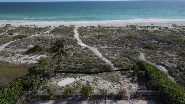 low and slow aerial of beach house construction in Florida (2 of 2)