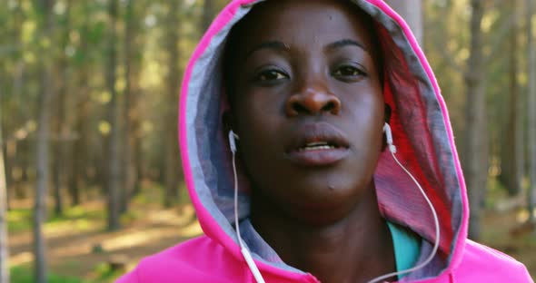 Female jogger warming up for jogging 