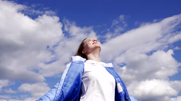 Happy Child in Autumn Jacket Enjoy the Sun on Sky Background Freedom