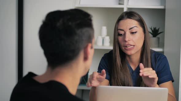 Doctor Discussing with His Patient