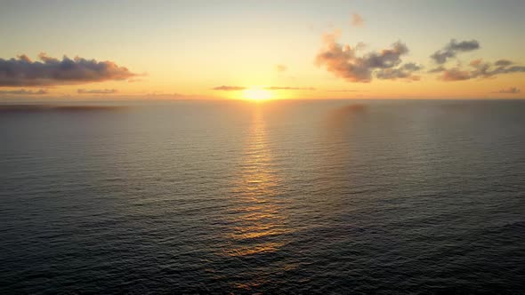 Beautiful Drone View Sunset Over Sea Ocean Waves Crashing on Beach