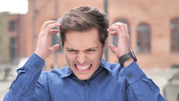 Outdoor Standing Angry Young Man Screaming in Frustration