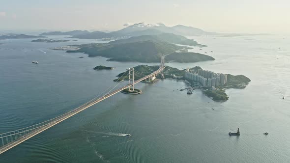 Amazing aerial shot of Tsing Ma Bridge and Ma Wan Island in Hong Kong