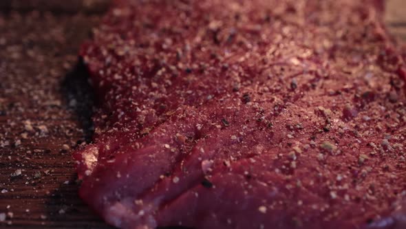 Mixed Pepper and Spices on the Raw Meat Steak