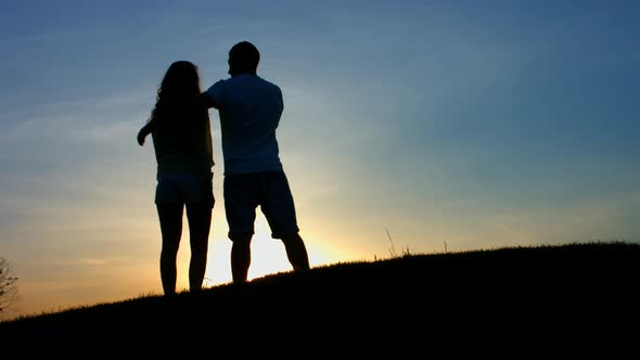 Guy Gently Hugs the Girl.