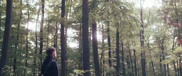 Guitar Player in the Woods