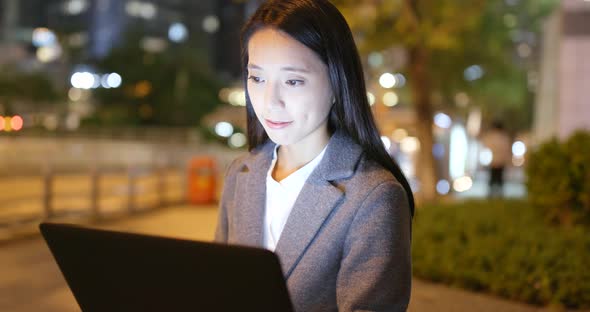 Asian business woman work on notebook computer