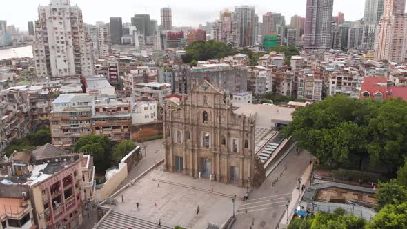 Rotating aerial view from front of famous Ruins of Saint Paul's, Macau
