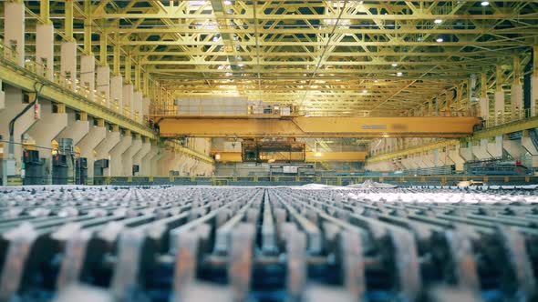 Production Line of the Copper Mill with a Loader Moving Above It